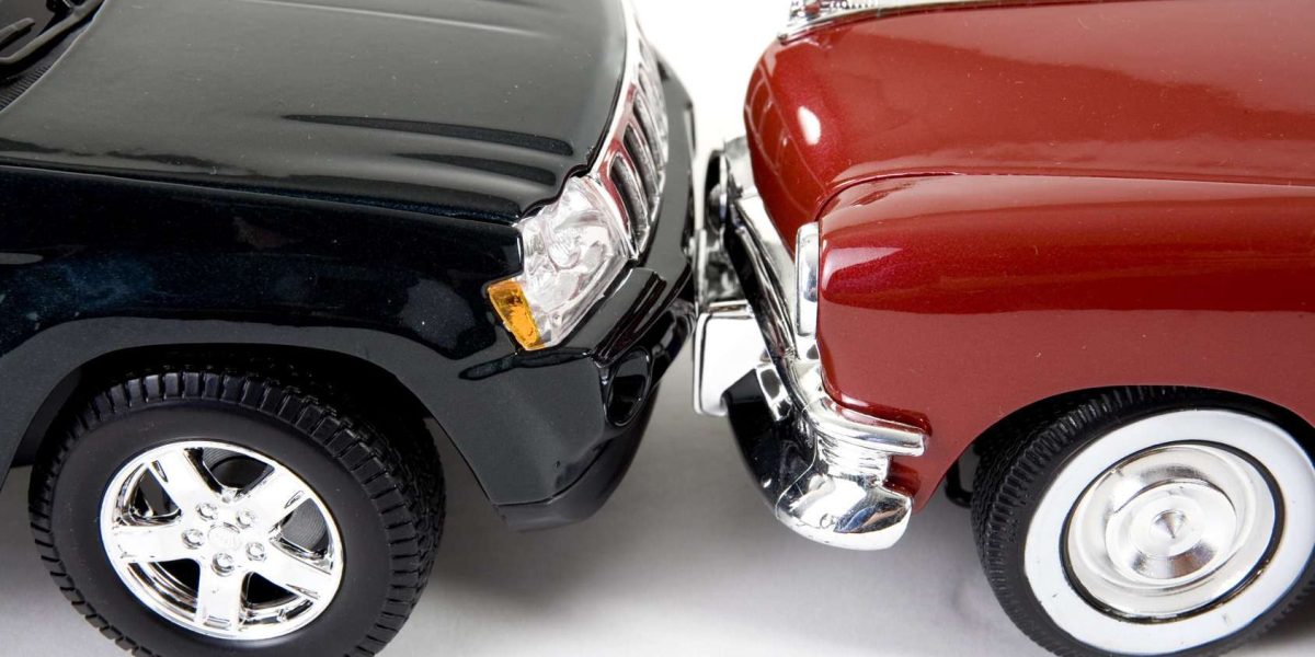 close up of collectible car over white background